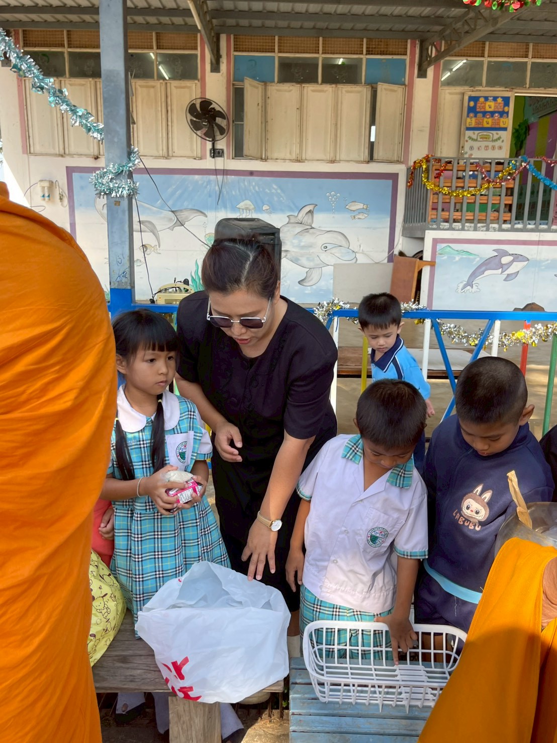 กิจกรรมทำบุญตักบาตร เนื่องในโอกาสวันเริ่มต้นเข้าสู่ปีใหม่ ปีพุทธศักราช ๒๕๖๙ - Image 25